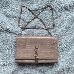 Normally wear Saint Laurent shoulder bag.